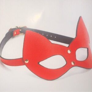 Red and Black Mask with Gold Accents